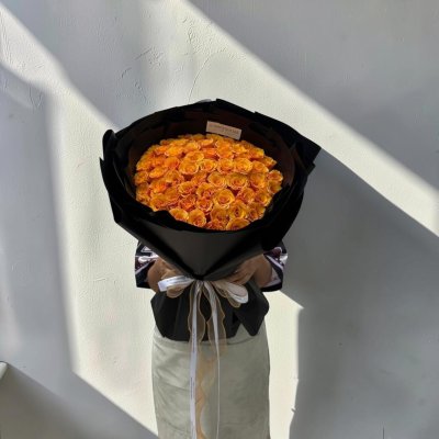50 Orange Roses with Black Wrapping