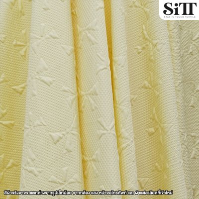 ผ้าอัดลายนูน [ลายโบว์]