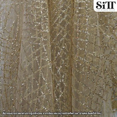 ผ้าลูกไม้กากเพชร [ลายหางนกยูง]