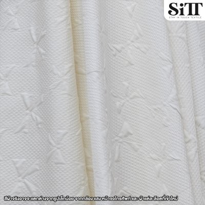 ผ้าอัดลายนูน [ลายโบว์]