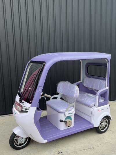 Kedar_e_tricycle_J50_purple_white_left_front_view