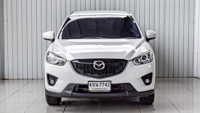 MAZDA CX-5, 2.0 SP ปี 2014 โฉม ปี13-ปัจจุบัน เบนชิน สีขาว เกียร์ AUTO ไมล์เพียง 317,520 km.