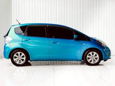 HONDA JAZZ, 1.3 HYBRID ปี 2012 โฉม ปี08-14 เกียร์AUTO สีฟ้า เครื่องยนต์ เบนซิน + ไฟฟ้า ไมล์น้อย 208,884 Km.