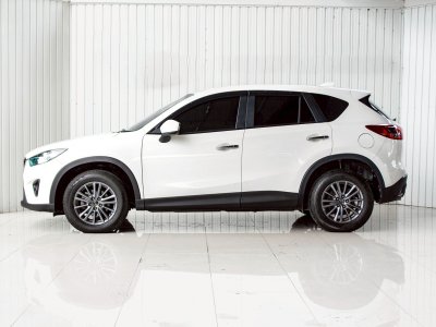 MAZDA CX-5, 2.0 SP ปี 2014 โฉม ปี13-ปัจจุบัน เบนชิน สีขาว เกียร์ AUTO ไมล์เพียง 317,520 km.