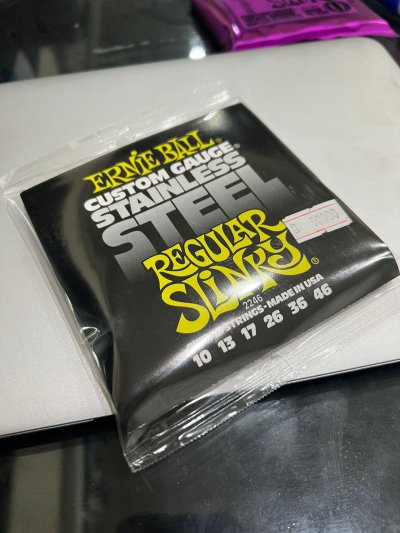 ERNIEBALL REGULAR SLINKY STAINLESS STEEL WOUND ELECTRIC GUITAR STRINGS, 10-46