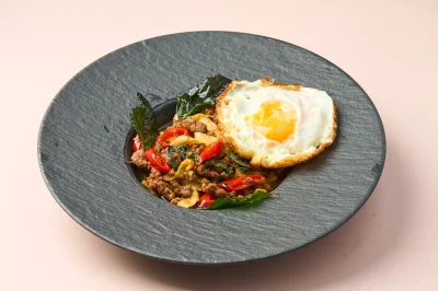 Home Made Pasta with Beef Kaprao (Beef/Pork  โฮมเมดพาสต้าซอสกะเพราเนื้อไข่ดาว เส้นสด (Fettuccine)