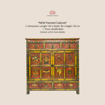 สิริมงคลสีอำพัน: ตู้ไม้เหลืองลายแปดมงคล