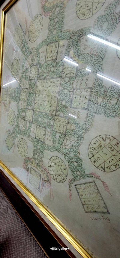 ผ้ายันต์ล้านนา ลายนาคเกี้ยว  ขนาดรวมกรอบ  64*64 ซม