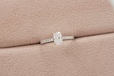 Radiant Cut Diamond With Hidden Halo and Side Pavé