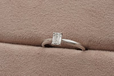 Emerald Cut Diamond With Peg Head Setting Solitaire Ring