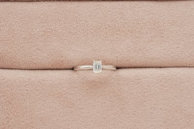 Emerald Cut Diamond With Peg Head Setting Solitaire Ring