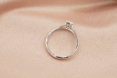 Emerald Cut Diamond With Peg Head Setting Solitaire Ring