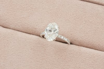 Oval Cut Diamond With Hidden Halo and Pavé Solitaire Ring