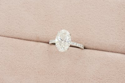 Oval Cut Diamond With Hidden Halo and Pavé Solitaire Ring