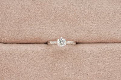 Round Cut Diamond With Spiral Sides Solitaire Ring