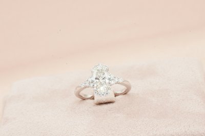 Oavl Cut Diamond With Side Stones and Halo Solitaire Ring