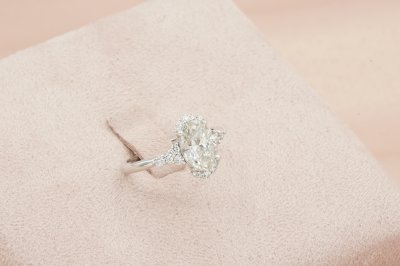 Oavl Cut Diamond With Side Stones and Halo Solitaire Ring