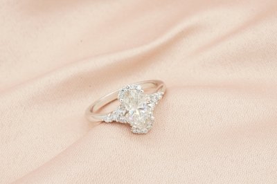 Oavl Cut Diamond With Side Stones and Halo Solitaire Ring