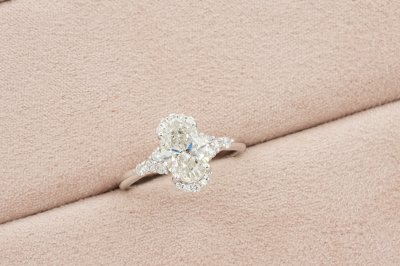 Oavl Cut Diamond With Side Stones and Halo Solitaire Ring