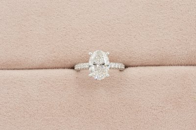 Oval Cut Diamond With Hidden Halo and Three Sides Pavé I