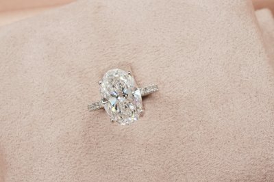 Oval Cut Diamond With Hidden Halo and Side Pavé l