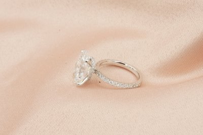 Oval Cut Diamond With Hidden Halo and Side Pavé l