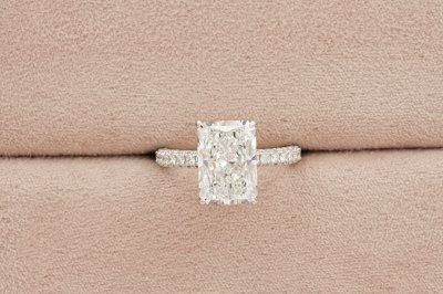 Radiant Cut Diamond With Hidden Halo and Three Sides Pavé