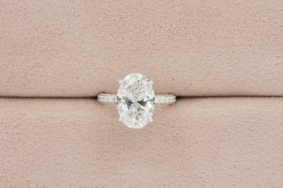 Oval Cut Diamond With Hidden Halo and Three Sides Pavé Il