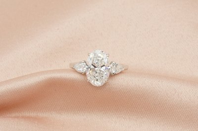Oval Cut Diamond Three Stone With Hidden Halo Solitaire Ring