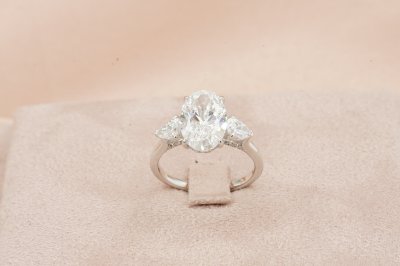 Oval Cut Diamond Three Stone With Hidden Halo Solitaire Ring