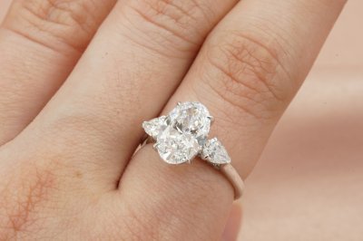 Oval Cut Diamond Three Stone With Hidden Halo Solitaire Ring
