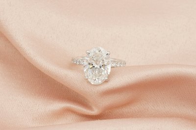 Oval Cut Diamond With Hidden Halo and Side Pavé ll