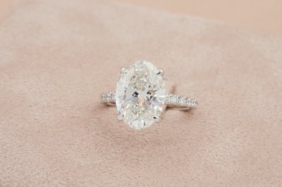 Oval Cut Diamond With Hidden Halo and Side Pavé ll