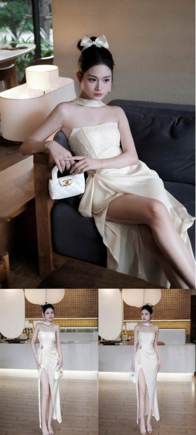 เดรสยาวสีครีมแบบเกาะอกผ่าข้าง ตกแต่งเข็มกลัดดอกไม้สีทอง