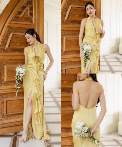 เดรสยาวสีเหลืองคล้องคอผ่าหน้าตกแต่งดอกไม้ที่อก