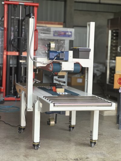 เครื่องปิดปากกล่อง FXJ6050