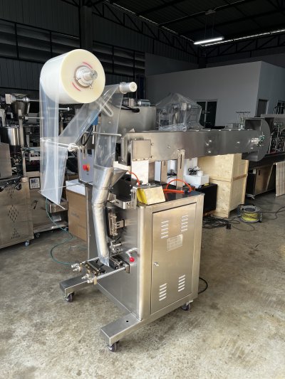 เครื่องบรรจุสายพานกระบะ HXL-KF100