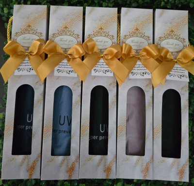 ร่มพับ3ตอน มีกันยูวี ใส่กล่องมีหูหิ้ว ผูกโบติดชื่อ