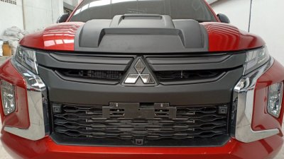 23 ครอบกระจังหน้า