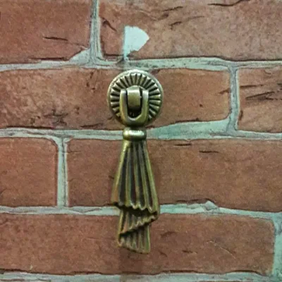 ปุ่มจับบานตู้