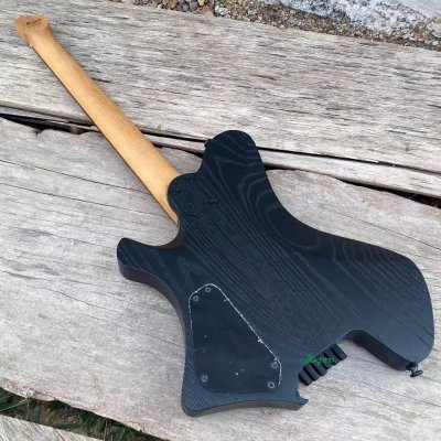 Rhea Roasted Ash with Veneer Flame Maple Blueburst HH