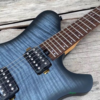 Rhea Roasted Ash with Veneer Flame Maple Blueburst HH