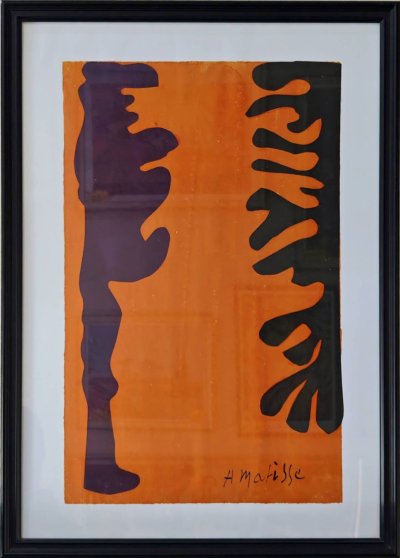 Arabesques noires et violettes sur un fond orange