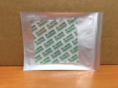 Si-Herb Dressing 10x10 cm แผ่นตาข่าย เคลือบสมุนไพร ป้องกันแผลติด (1 แผ่น)