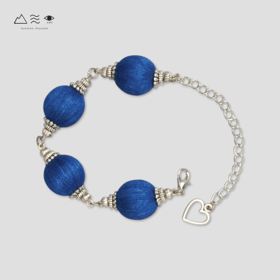 สร้อยข้อมือระย้า ลูกปัดฝ้ายย้อมสีธรรมชาติ - สั้น สร้อยข้อมือระย้า ลูกปัดฝ้ายย้อมสีธรรมชาติ - สั้น