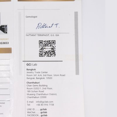 Gold Emerald Ring with Diamond Halo