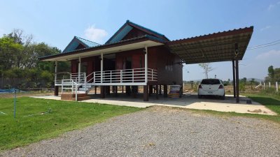 บ้านพร้อมที่ดิน 1 ไร่ 1 งาน 29 ตร.วา บ้านทรงไทยคู่ (น๊อคดาวน์)