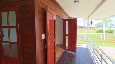 บ้านพร้อมที่ดิน 1 ไร่ 1 งาน 29 ตร.วา บ้านทรงไทยคู่ (น๊อคดาวน์)