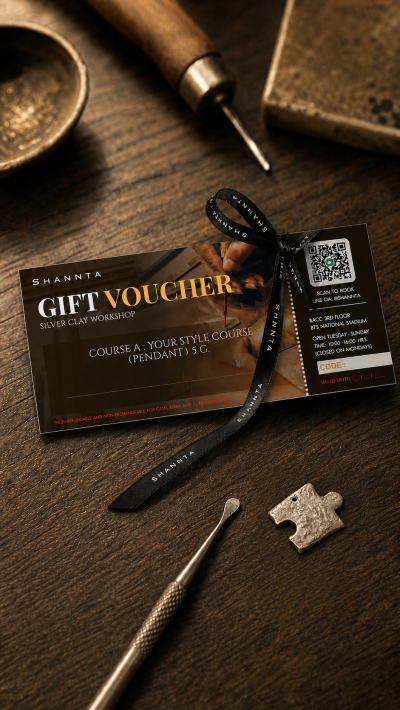 Hand holding Shannta Silver Clay Workshop physical gift voucher card in an elegant envelope for luxury gifting