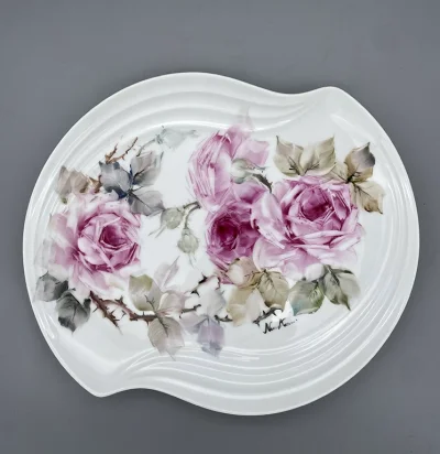 Hand painted Roses- An oval-like porcelain plate with a soft, curved edge